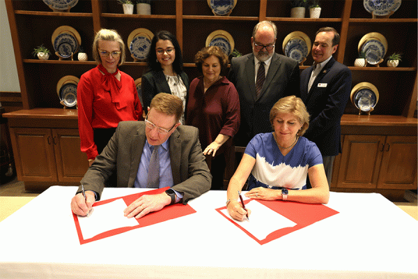 UNO President Kathy Johnson and Nicholls State University President Jay Clune sign an agreement that will expand pathways to a mechanical engineering degree in South Louisiana. 