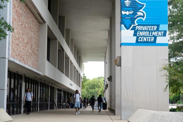 Students walk across campus of the University of New Orleans on the first day of fall semester classes.