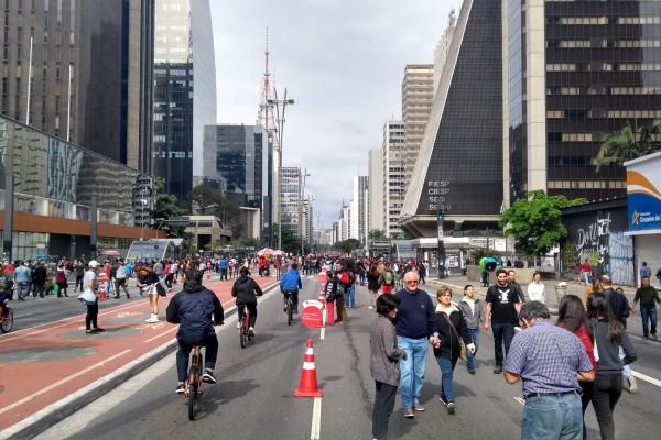 Photo of pedestrians and bikers in Sao Paulo, Brazil.